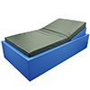 Petit coussin de positionnement au lit