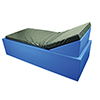 Grand coussin de positionnement au lit